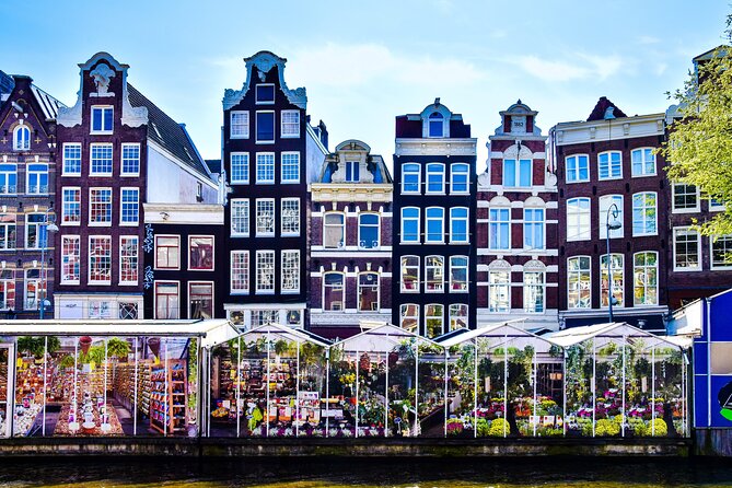 Amsterdam Day Trip from Brussels With Cheese, Clogs and Windmills - Reaching Amsterdam and finding your way around