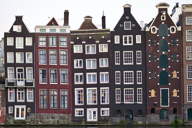 Amsterdam Day Trip from Brussels With Cheese, Clogs and Windmills - The red light district and Amsterdam’s historic neighborhoods