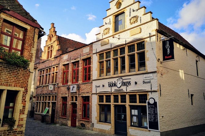 Antwerp and Ghent Day Trip from Brussels With Atomium Photo Stop - Antwerp Cathedral and 90 minutes to explore