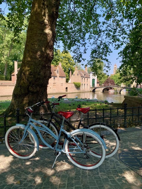 Bruges: City Bike Tour with a Local - Canals, landmarks, and the best photo pauses