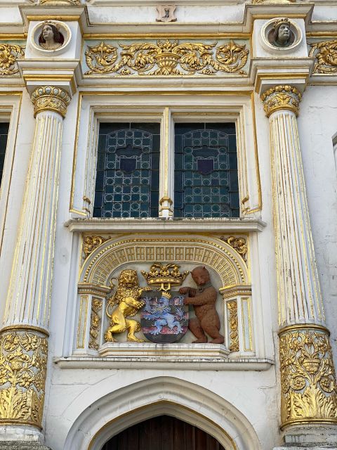 Bruges Guided Walking Tour: Stories, Mysteries and People - Narrow streets, the Fish Market, and old trade