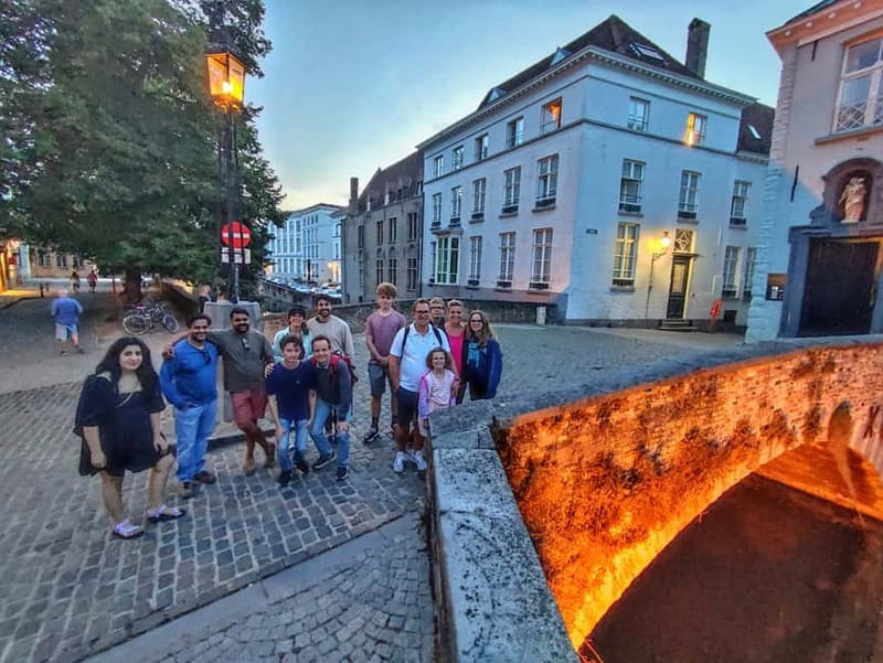Bruges: Nightly Tales and Untold History Walking Tour - From Markt and Burg Square into the older center