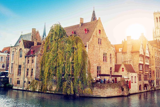 Bruges Uncovered: Historic Walking Tour & Canal Boat Experience - From the station to Minnewater Lake