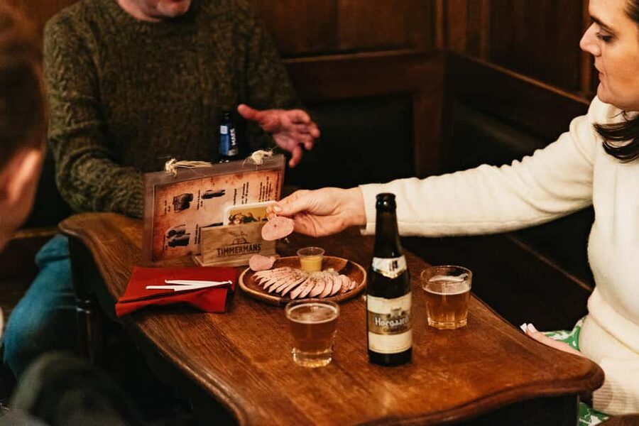 Brussels: Beer Tasting Tour with 7 Beers and Snacks - Beer with cheese, fries, sausage, and chocolate