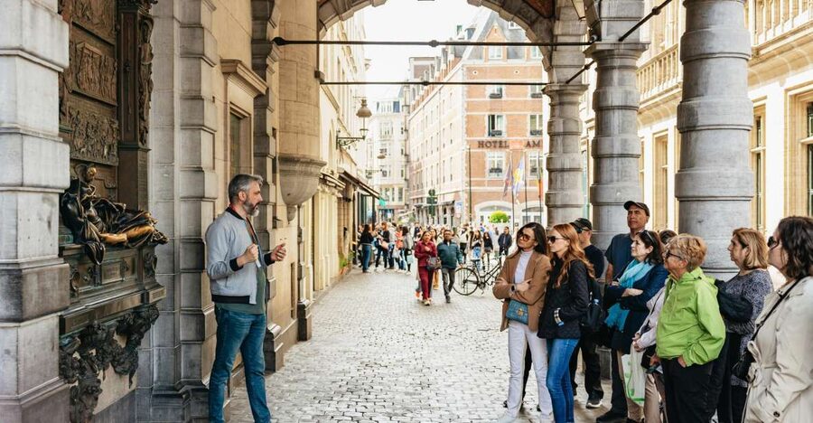 Brussels: City Highlights Walking and Tasting Tour - The Royal Saint-Hubert Galleries explain Brussels shopping culture