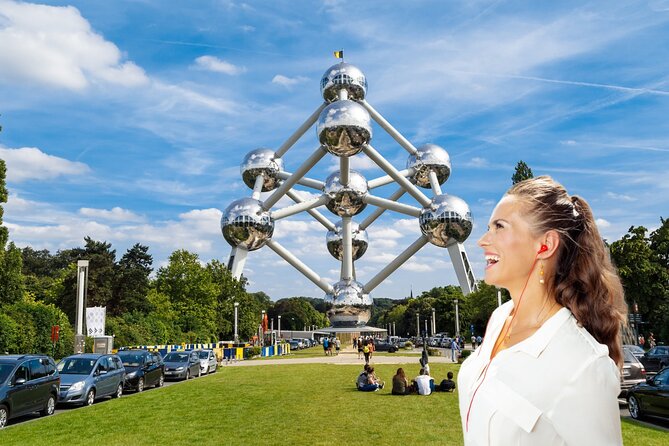Brussels: City Walk with Audioguide in 7 Languages on your Phone - Manneken Pis, small statue, huge reputation