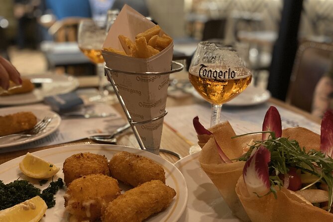 Brussels Food Tour: 10 Tastings of Waffles, Beers, Fries & More - Brioche, strawberries, and the first taste of Belgian sweets