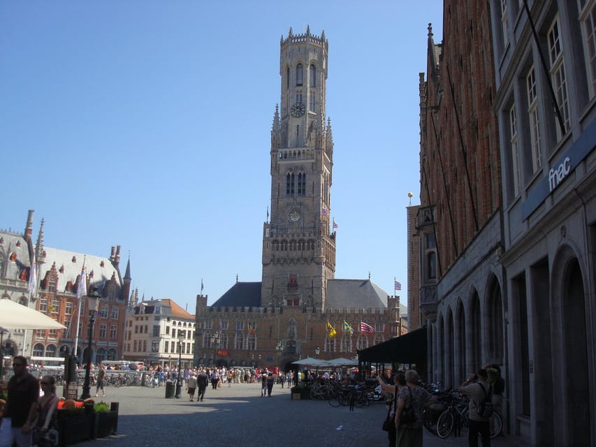 Brussels: Private & Customizable Day Trip to Bruges - Arriving at the Markt and Belfry Tower