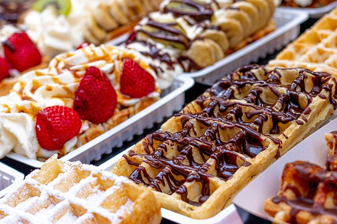Brussels Walking Tour with Waffle Tasting: History and Delights - The Royal Galleries and your Belgian waffle