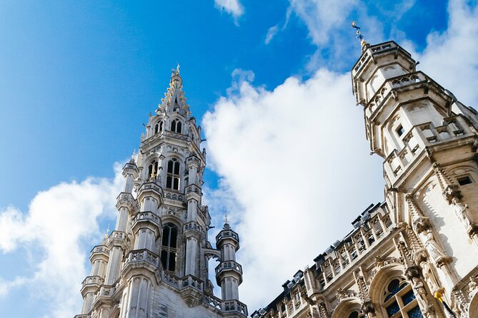 Brussels Walking Tour with Waffle Tasting: History and Delights - Sablon boutiques and a change in the city’s mood