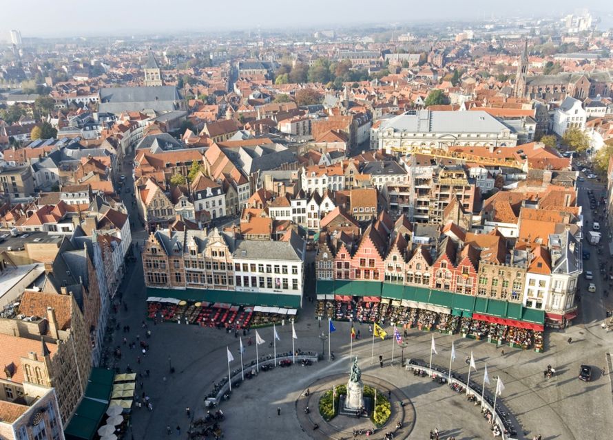 From Amsterdam: Day Trip to Bruges in Spanish or English - Meeting the guide at the Aloha Bowling center