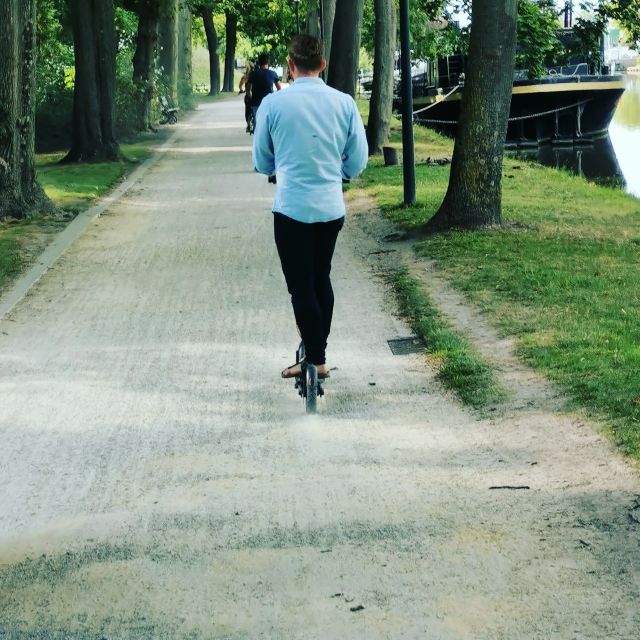 From Bruges to Damme: Private Electric Scooter tour - Canals, windmills, and a possible waterside stop