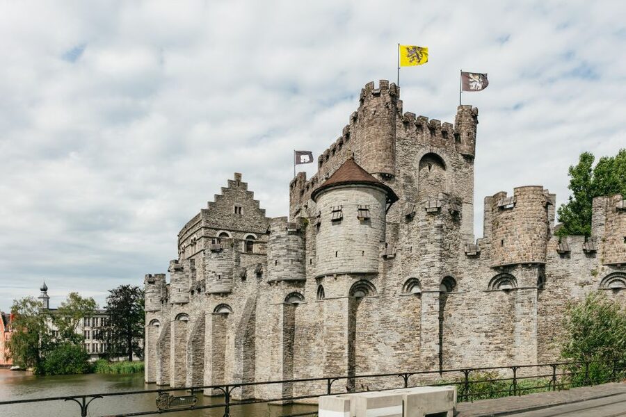 From Brussels: Guided Day Trip to Bruges and Ghent - Saint Bavo Cathedral and the Van Eyck masterpiece