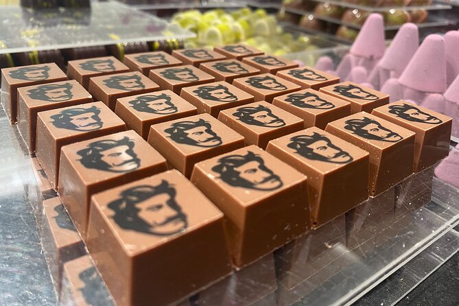 Ghent: Famous Belgian Chocolate Walking Tour with Tastings - What the guide adds between the shops