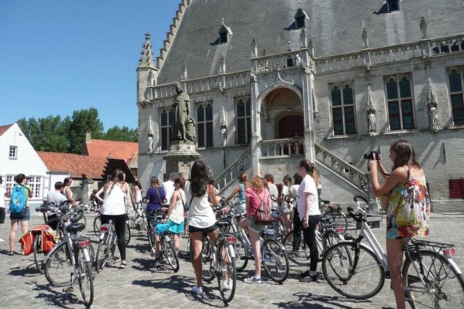 Private Bruges 3.5-Hour Guided Bike Tour: Discover Hidden Gems - Jan Van Eyckplein and the canal streets