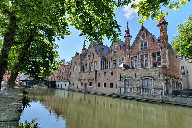 Private tour: From your hotel + see the Madonna of Michelangelo - De Halve Maan and the beer pipeline beneath Bruges